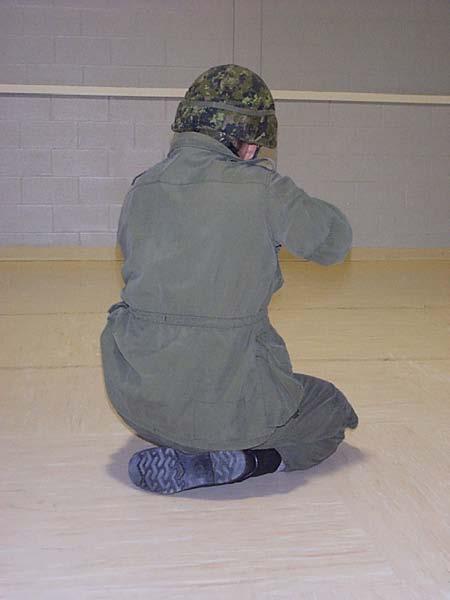 Marksmanship Theory and Coaching Figure 3-52: Kneeling Position Sitting on Instep 135. Natural Alignment.