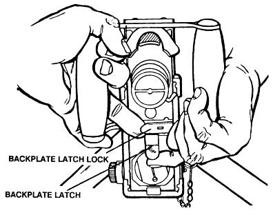 2 The bolt must be forward before the backplate is removed. If the bolt is to the rear, push down on the bolt latch release, place palm up on the retracting slide handle, and ease the bolt forward.