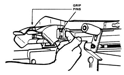 assembly. The pins of the feed throat must line up with the pinholes in the receiver (see diagram below).