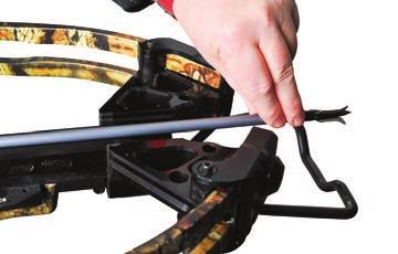 When loading an arrow in your crossbow, do not allow any part of either hand to move into the release path of the bowstring because if the bow were to accidentally fire, the string will severely