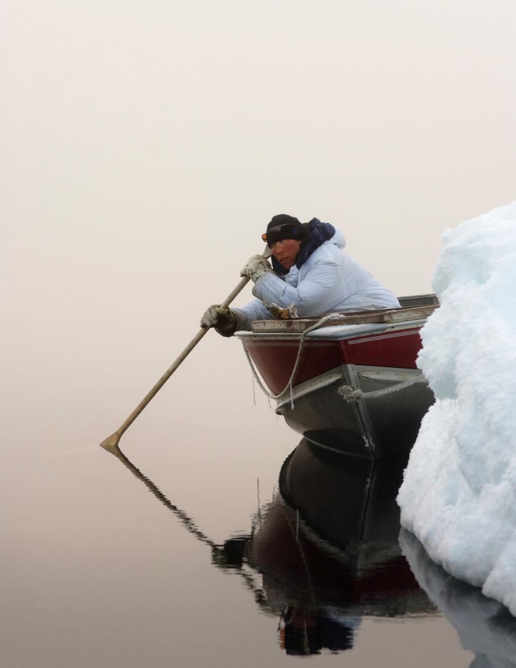 Steven Kazlowski/Getty Images An Inupiat hunter uses a wooden oar to