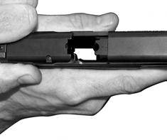 To do this, grasp the pistol with your finger off the trigger and outside the trigger guard, point the muzzle in a safe direction, depress the magazine release and remove the magazine.