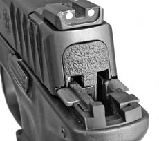 recoil spring guide firmly in one hand, place the rear of the