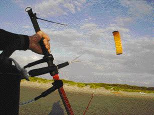 power and slow the kite down. brake brake brake brake The brake lines are connected to the kite as usual but the lines cross to the opposite side.