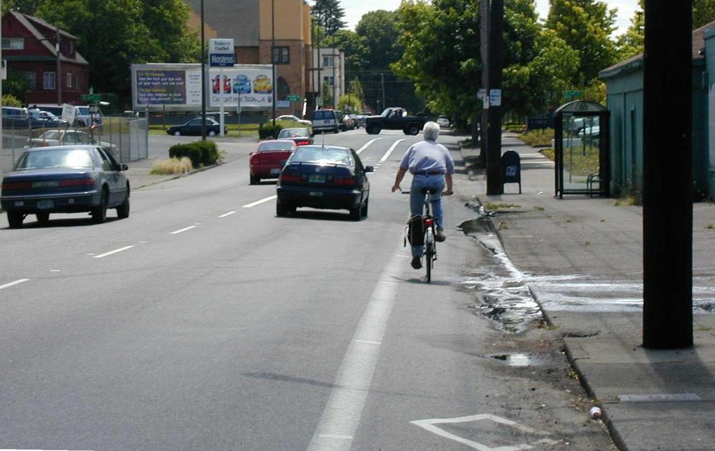 Bicyclists must cross a lane to