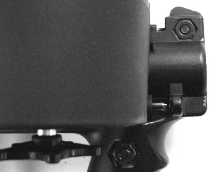 Clip on the M-98, with the Rip-Clip pins behind the holes (Figure 4a).