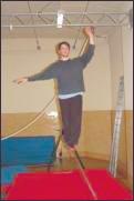 Manual for Tight Wire and Slack Rope Lunge, showing correct arm positioning part2/ Basic Techniques on Tight Wire Arm Position: The use of the arms is most important to balance and as seen in the
