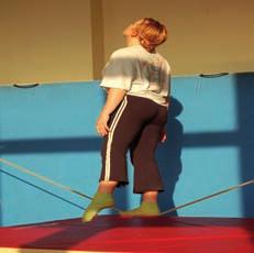 WALKING As with the tight wire it is easier to start by sliding the feet along the rope.