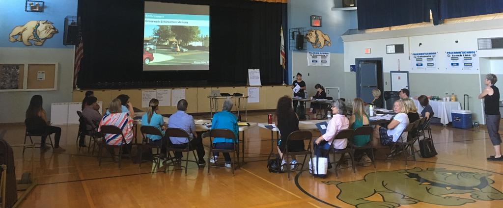 Participants learning the 6 E s approach to pedestrian and bicycle safety. The workshop was hosted from 9:00 am to 1:30 pm at the Palermo Middle School Cafeteria.