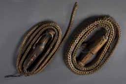 Item number: Fry0159 Item Number: Fry0159 Category: Whip Materials: Wood and heavy hide braiding Description: These early Eskimo whips were made for managing sled dogs.