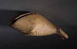 Item number: Fry0178 Item Number: Fry0178 Category: Box - Point Box Period: 1850-1875 Materials: Wood (cedar) Description: This cedar point box, in the form of a whale, probably dates to early in the
