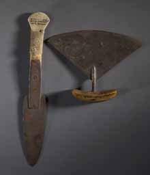 The knife is of the style utilized to cut blocks of snow for house/igloo construction, however it is smaller than most. The ulu is large, with a musk ox handle.