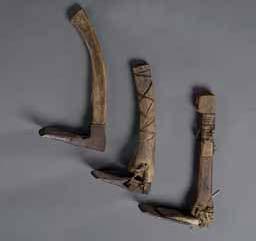 Item number: Fry0180 Item Number: Fry0180 Category: Adz Materials: Wood, bone, steel bits and sea mammal hide lashings Description: These Eskimo adzes are of the style used by the Bering Sea Eskimos