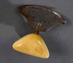 Item number: Fry0207 Item Number: Fry0207 Category: Ulu Period: 1900-1925 Materials: Walrus ivory and metal Description: Small ulu with triangular walrus ivory grip. This ulu was collected by W.R.