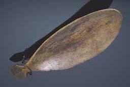 Item number: Fry0072 Item Number: Fry0072 Category: Dish Materials: Bone Description: Dish, of bone, in the general shape of a whale with cut flukes, probably used to provide a drink of