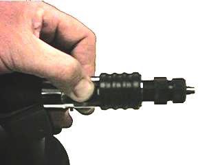 Proceed as follows to replace a mandrel/adapter with nose piece: 1 Disconnect the tool from the compressed air supply. figure 6.2.