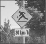 limit on streets is reduced to 30 km/h at schools and playgrounds.
