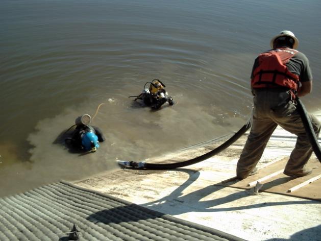 Underwater cleaning of structures, vessels and
