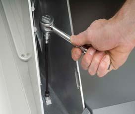 Tighten the bolts that secure the uprights.