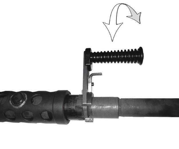 Slide barrel into the barrel guide sleeve with the carrying handle pointing upwards (the guide stud in the sleeve will enter the long groove on the barrel. 3.