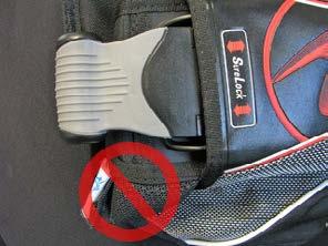 To install either pouch, grasp the Lobe Retaining D-ring (if equipped) with your opposite hand and slide the closed end of the pouch into the opening of the holster.