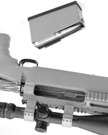 Move the safety lever to the rear (SAFE) position. 3. Raise the bolt handle. 4. Pull the bolt all the way to the rear. 5. Insert the required number of cartridges into the magazine. 6.