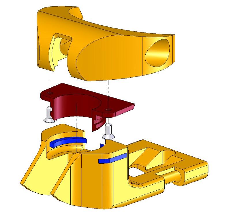 the vertical axis while the square edged plugs (blue components) provided vertical retention of this part (and hence also the toe wings).