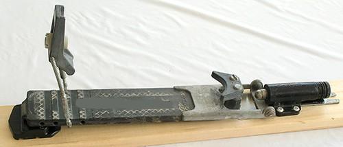 the heel into place on the ski-mounted plate, as shown in Figure 24. This was an innovative way of solving the problem of binding height and complexity.