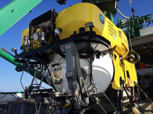 (Luis Lamar/Conservation International via AP) The Pisces V submersible sits on the deck of a research vessel during an expedition to previously unexplored seamounts off the coast of Hawaii's Big