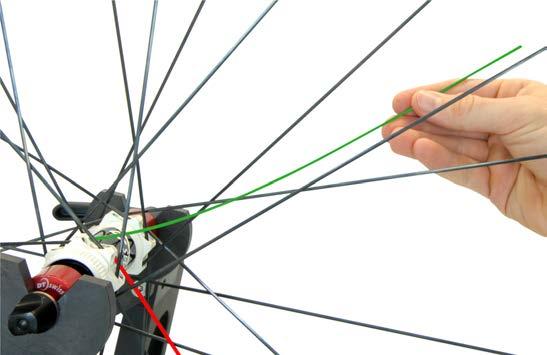 Caution: The figure shows a wheel with bladed spokes. Only for spokes in the inner spoke holes of the hub flange. 6.