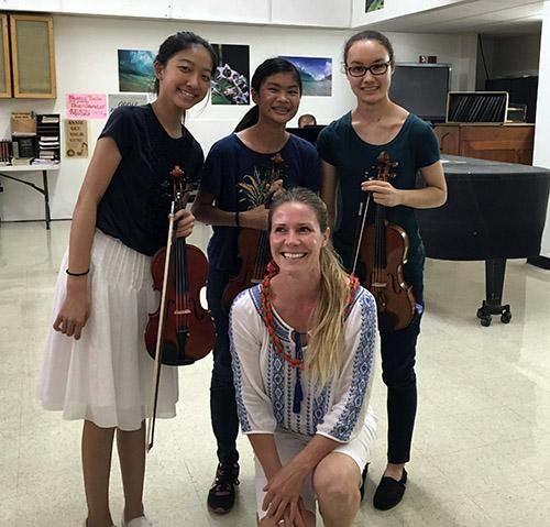 Master violinist Master teacher Sabrina Hopcker worked with three violinists,
