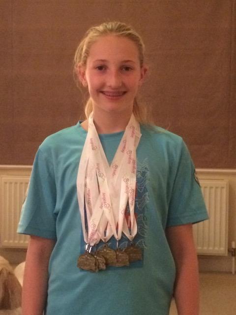 seven swims she got 6 gold medals and 1 silver with 5 out of 7 new personal bests and 5 new county times, bring her total county