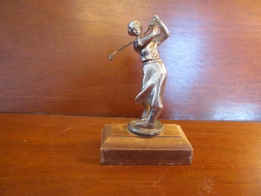 Bronze Cigarette Lighter, in the shape of a golf bag with clubs 5 long, in vg condition.