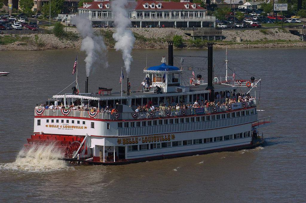 Emigrate The process of leaving one country or region to live in another country or region. This photograph shows the Belle of Louisville.