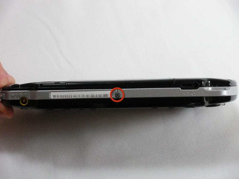screws are on the top of the PSP; the longer 5 mm screw is
