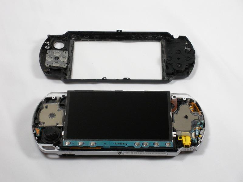 Start on the right hand side of the PSP bezel, and carefully