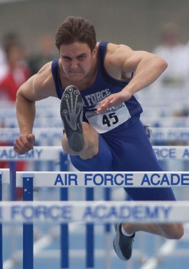 HURDLE CLEARANCE: Opposite Arm The other arm stays relaxed with the hand near the hip