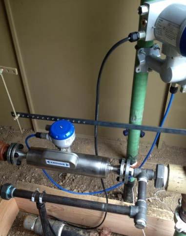 stream by using a smaller flowmeter and install an orifice plate downstream of the meter to increase the back
