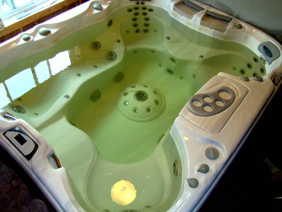 My hot tub has never had a commercial chemical since brand new. No way was I going to bath in chemical water! Until recent months, my water was crystal clear, now you see a light yellow tint.