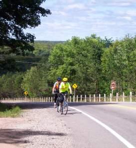1. Physical/Geographic Many secondary roads are unpaved or poorly paved for road cycling, Some roads with high traffic volumes lack paved shoulders Courtesy of Haliburton Highlands Trails & Tours