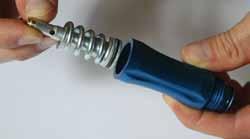 These can be unscrewed by hand or using a 3/8 hex key in the top and a 5/16 hex key in the bottom of the inline regulator.