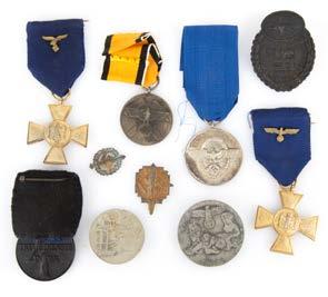 196 Assortment of Nazi breast badges 197 Three German WWII medals including War Victims Care medal 198 Assorted WWII German