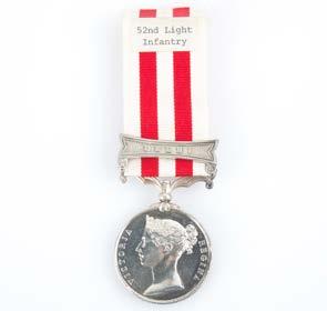 Africa medal 1901-1902, ascribed Est $200-400 404 British Silver Victoria Punjab campaigns medal ascribed with verification Est $200-400 405 Two British silver medals including: Victoria