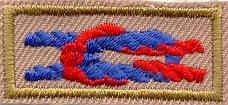 He produced knots with white backgrounds for Sea Scout whites, Navy blue/black backgrounds for Sea Scout blues, tan backgrounds for Sea Scout tans and BSA tan shirts, and green backgrounds for