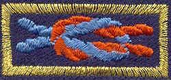 An additional knot in blue and orange, but with gold Mylar border, identifies recipients at the regional and national level.