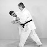 The second element could be a reverse haito to the neck of the opponent; finally, and as a last element, you ll do the kote-gaeshi by twisting your body to the left (photos 49-53).
