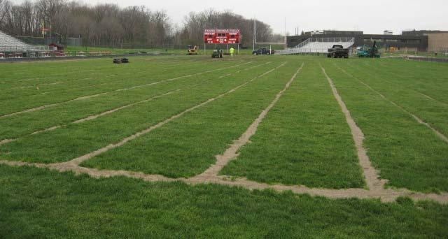 Image 2: Grand Blanc High School athletic field after the drain line installation process, Grand Blanc,