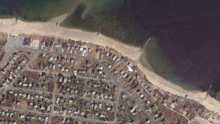 Details: 1) There is only one structure currently trapping sediment along Town Neck Beach (Figure 29), as seen by the extensive buildup of sediment on one side.