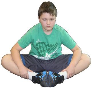 INNER THIGH STRETCH Sit with feet pulled towards the body, soles of feet touching Place