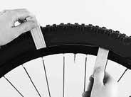 f your wheels are attahe with quik-releases to thrame an thork, you only nee two tyre levers an a pump (a).